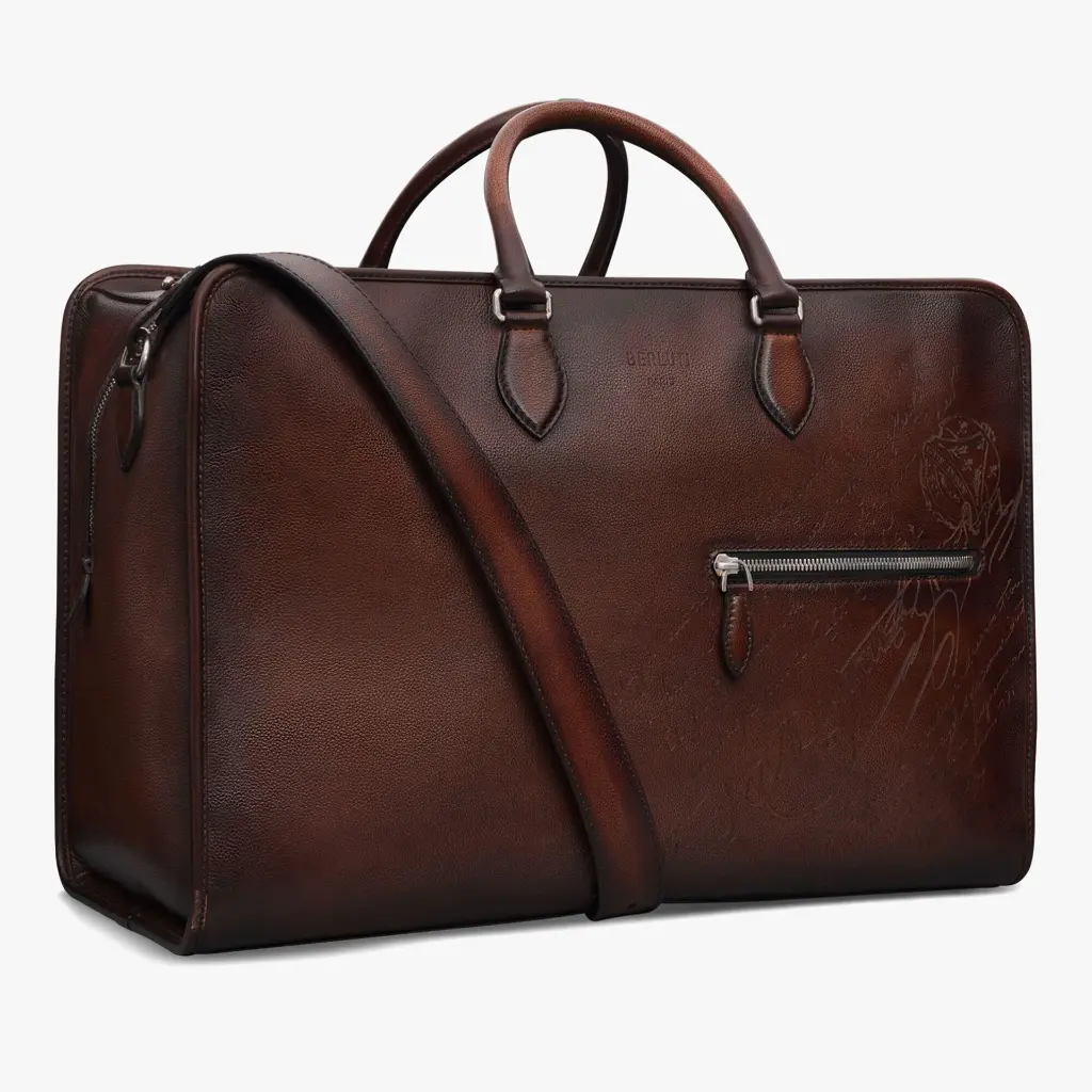 M245423_overnight-scritto-leather-travel-bag_soft-brown_berluti_02.webp