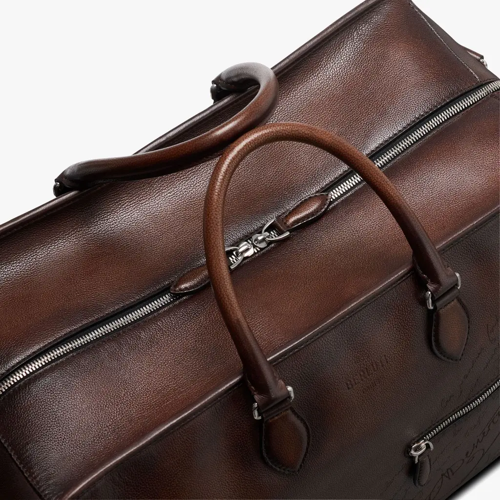 M245423_overnight-scritto-leather-travel-bag_soft-brown_berluti_06.webp